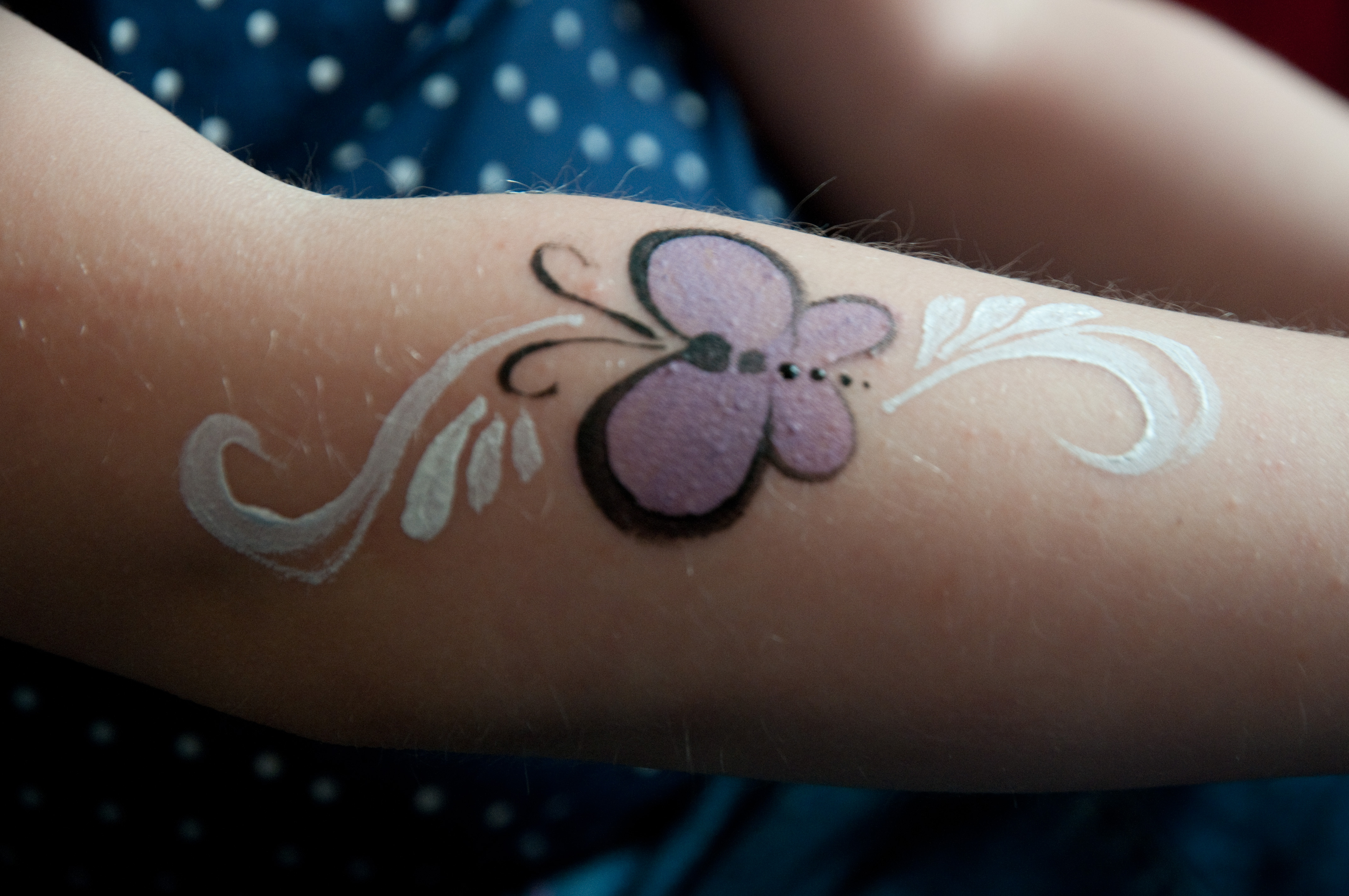 Schmetterling auf Arm